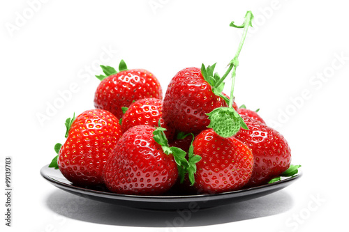 Strawberries on plate isolated on white background