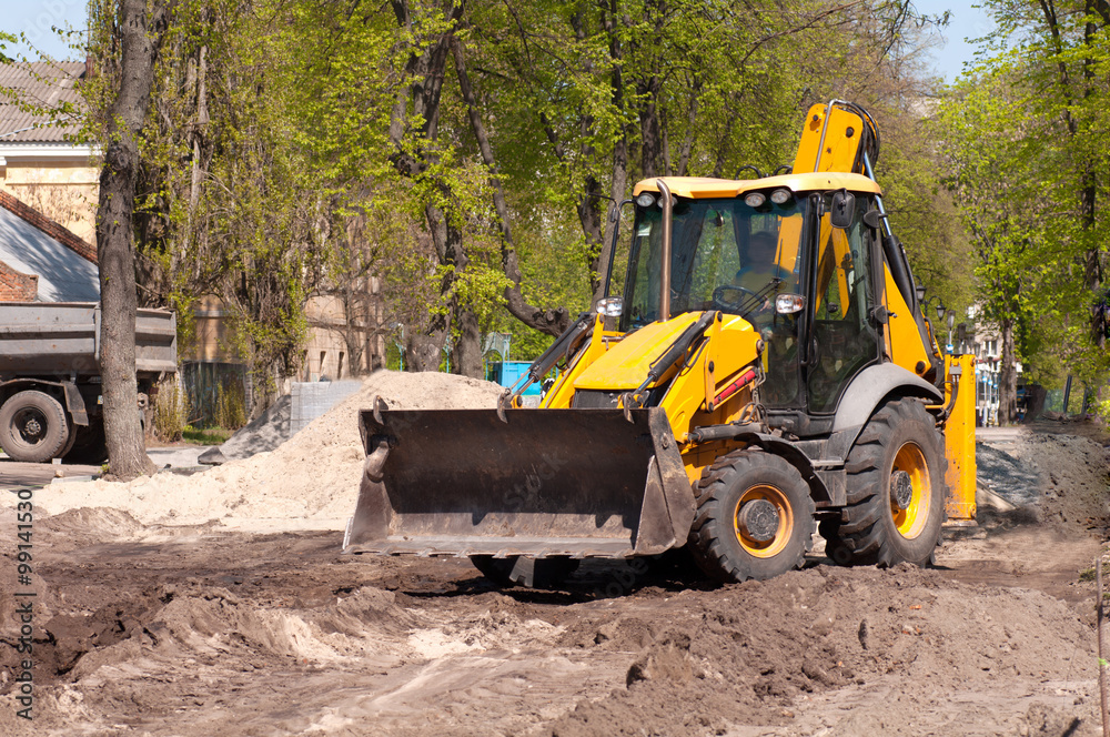 excavator works with the earth closeup excavator works with the earth closeup