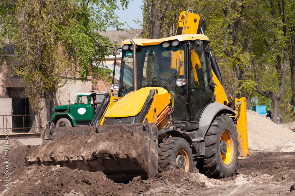 excavator works with the earth closeup excavator works with the earth closeup