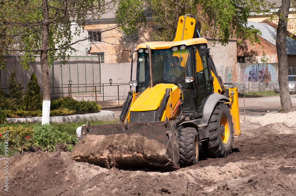 excavator works with the earth closeup excavator works with the earth closeup
