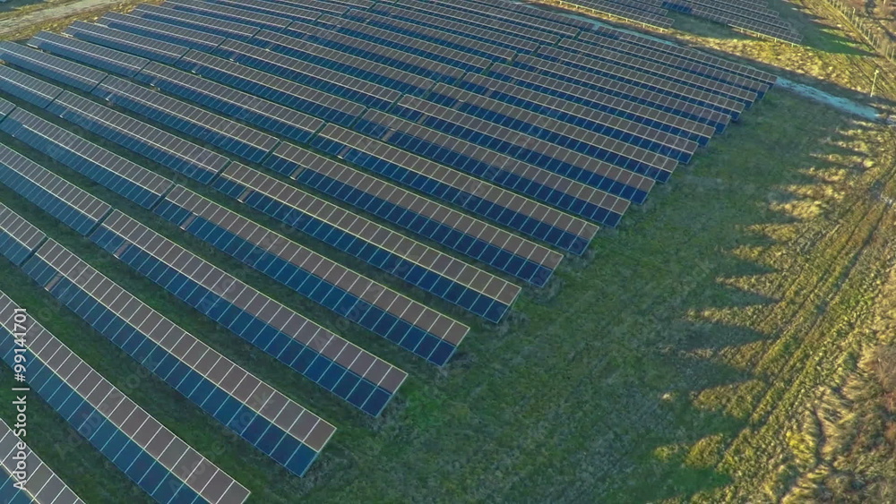 AERIAL industrial view Photovoltaic solar panels producing renewable energy AERIAL industrial view Photovoltaic solar panels producing renewable energy