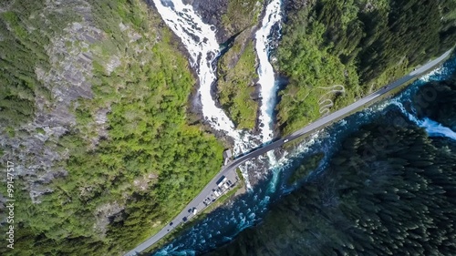 Aerial footage Latefossen Waterfall Odda Norway. Latefoss is a powerful, twin waterfall. View from the bird's-eye view. photo