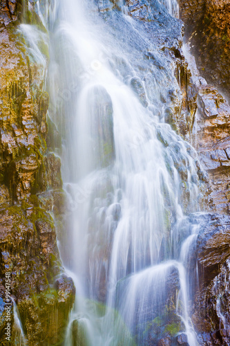 Flowing Waterfall in Mountains