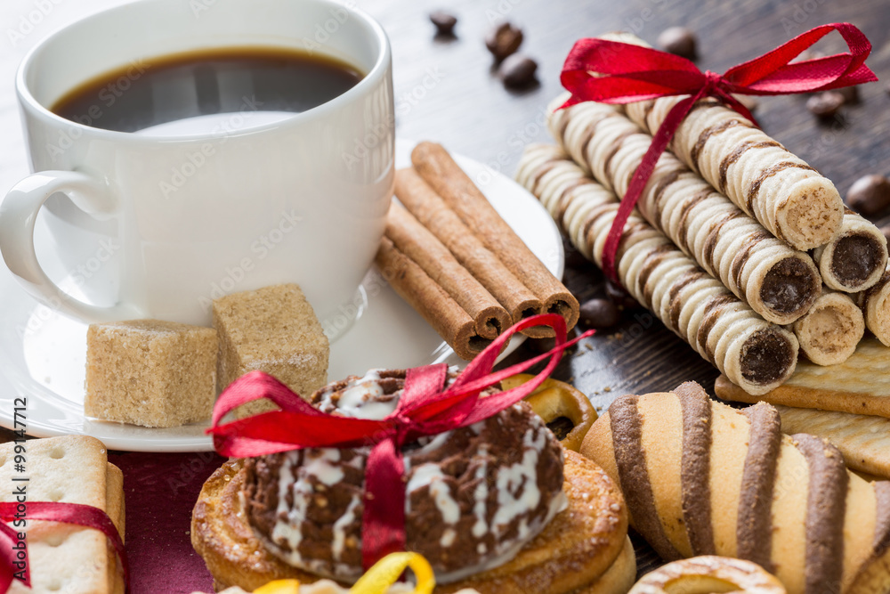 Biscuits and coffee on table Biscuits and coffee on table