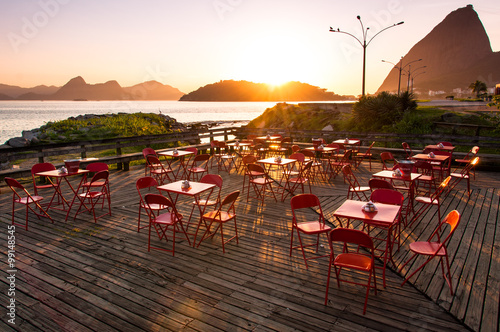 Cafe Tables and Chairs by Sunrise in Rio de Janeiro