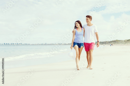 Romantic young couple on the beach