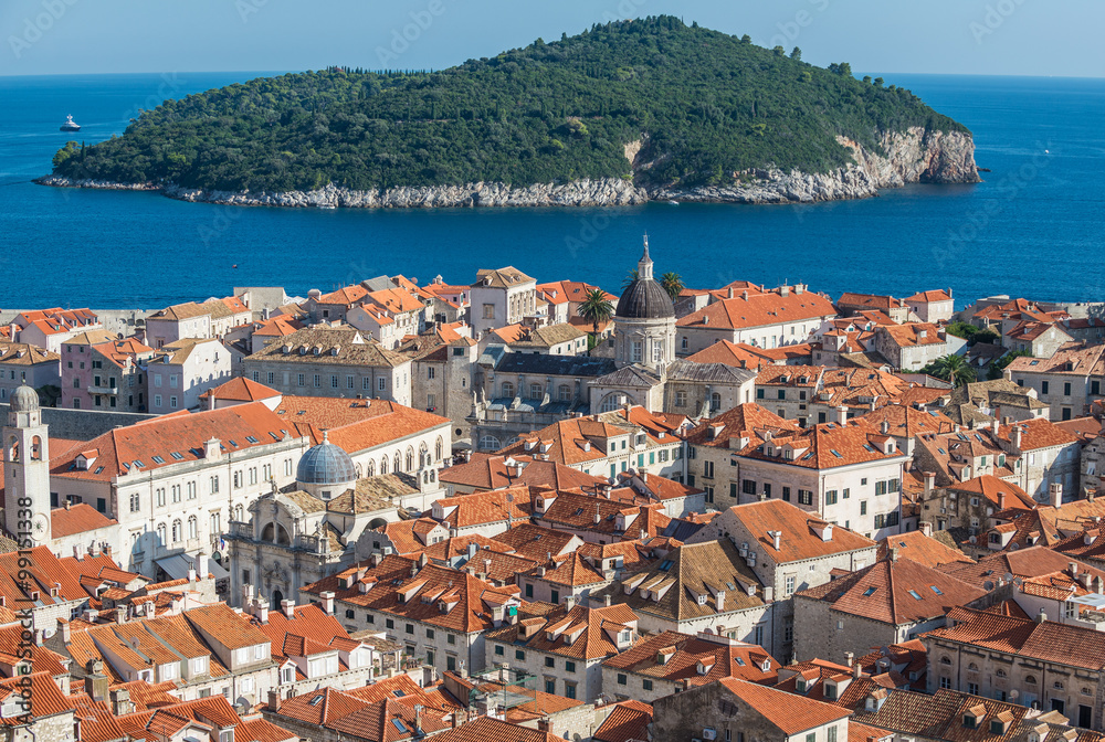 Aerial view from Walls of Dubrovnik with Cathedral and Lokrum island on background, Croatia