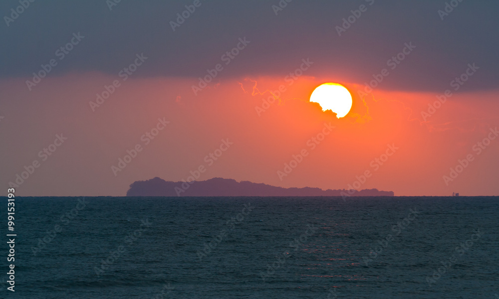 Seascape view of sunrise at Koh Chorakhe island in the morning. Scenery from Thung Wua Laen beach in Chumphon province, Southern Thailand.