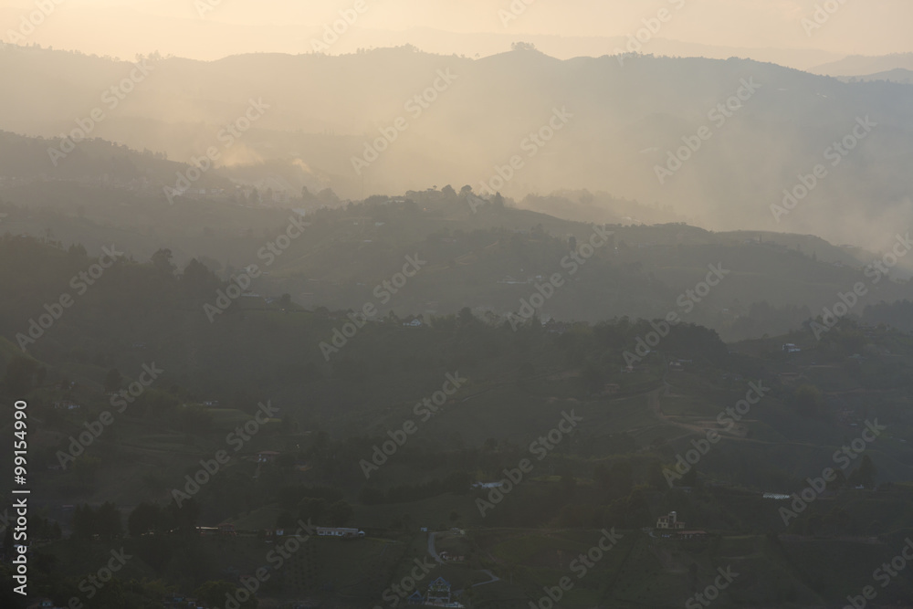 Fototapeta premium Sunset and mountains at Guatape in Antioquia, Colombia