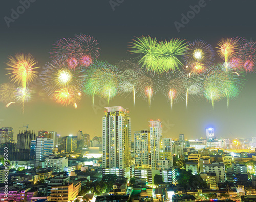 cityscape in the night with firework