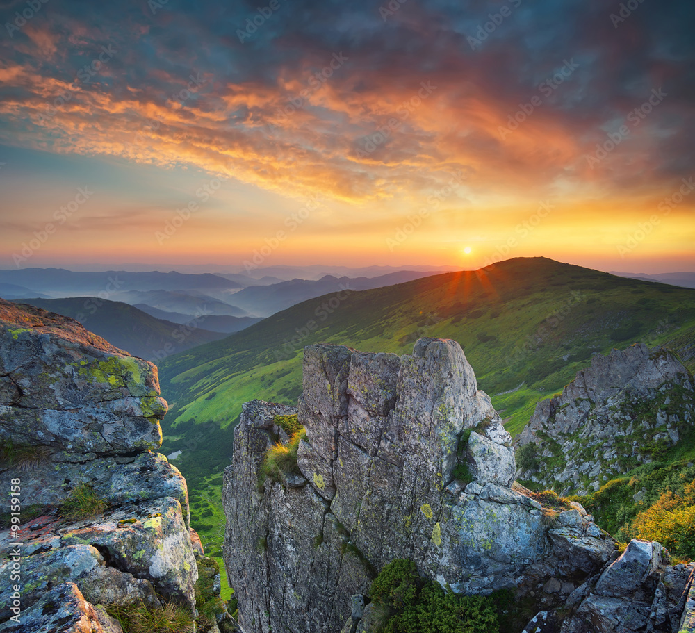 Obraz premium Mountain valley during sundown. Natural summer landscape