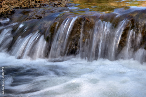 Fototapeta Naklejka Na Ścianę i Meble -  closeup rushing water cascade