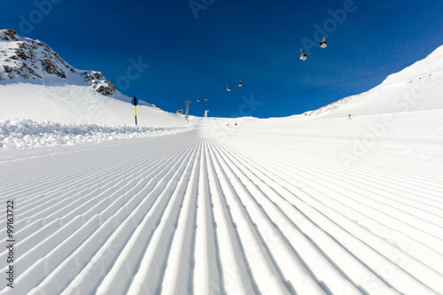 Groomed ski run at ski resort