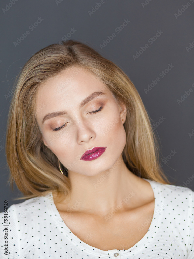 Naklejka premium Portrait of beautiful young woman . Isolated on white background
