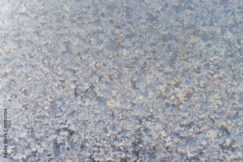 Ice floral pattern on glass. Macro view. Holiday seasonal background.
