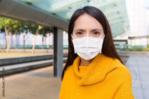 Asian Woman wearing the face mask at outdoor