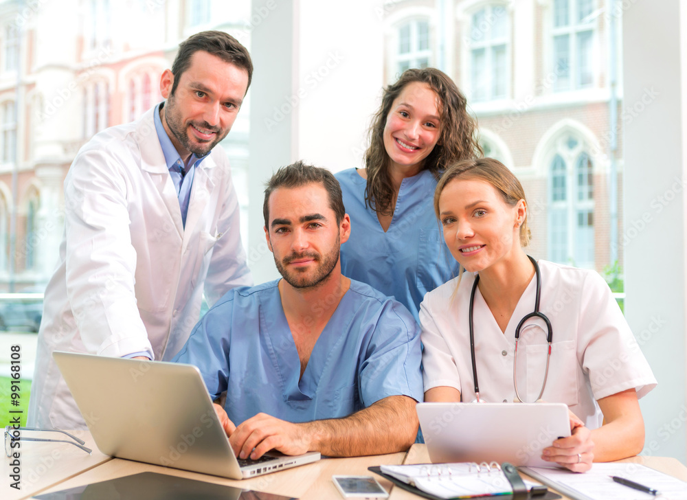 Medical team working at the hospital all together