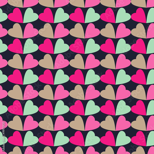 Seamless vector background with decorative hearts 