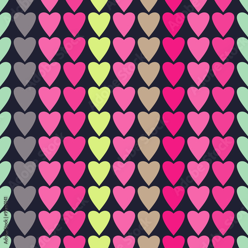 Seamless vector background with decorative hearts 