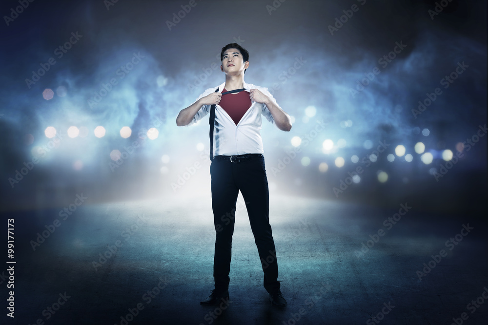 Asian business man open shirt like super hero Asian business man open shirt like super hero
