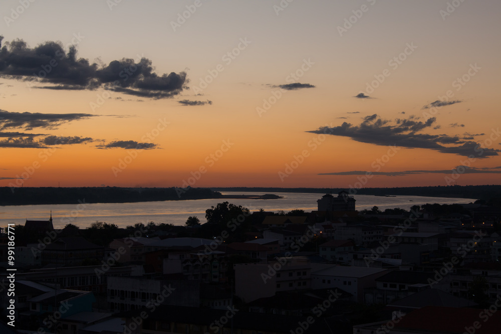 Sunrise over Mekong River in a Mukdahan city skylin Sunrise over Mekong River in a Mukdahan city skylin