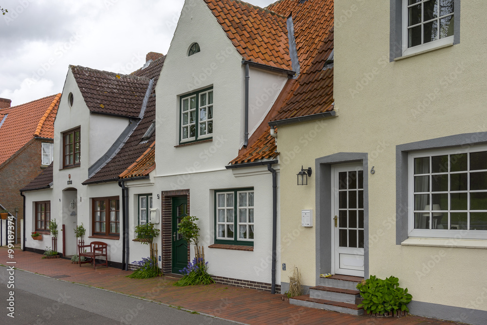 Street view od a town Toenning on the Eider river near its mouth at the North Sea in the district of Nordfriesland in the German state of Schleswig-Holstein.