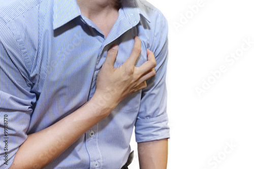 isolated man having a heart attack grab his chest with pain