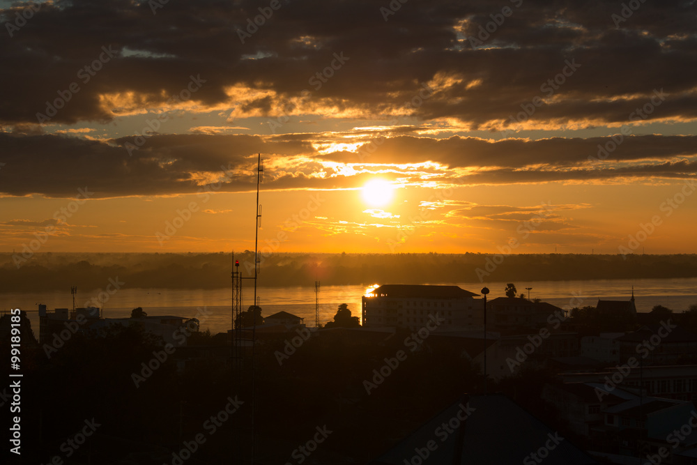 Sunrise over Mekong River in a Mukdahan city skylin Sunrise over Mekong River in a Mukdahan city skylin