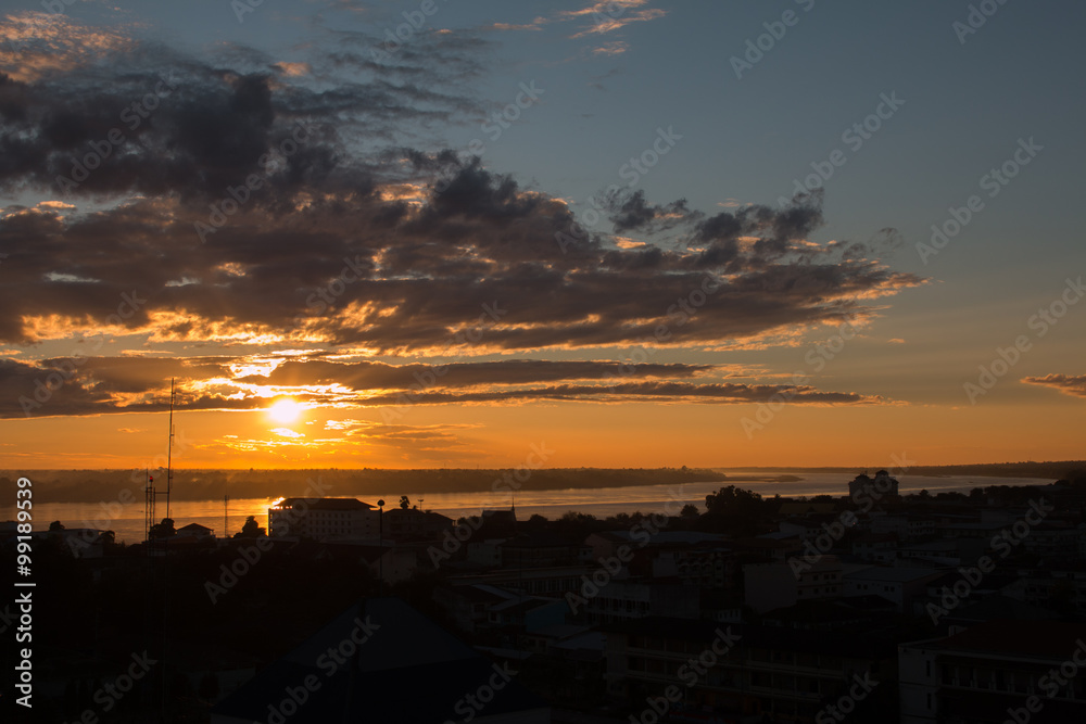Sunrise over Mekong River in a Mukdahan city skylin Sunrise over Mekong River in a Mukdahan city skylin