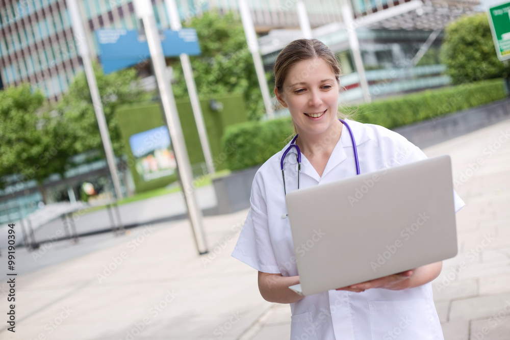 young doctor using a laptop computer