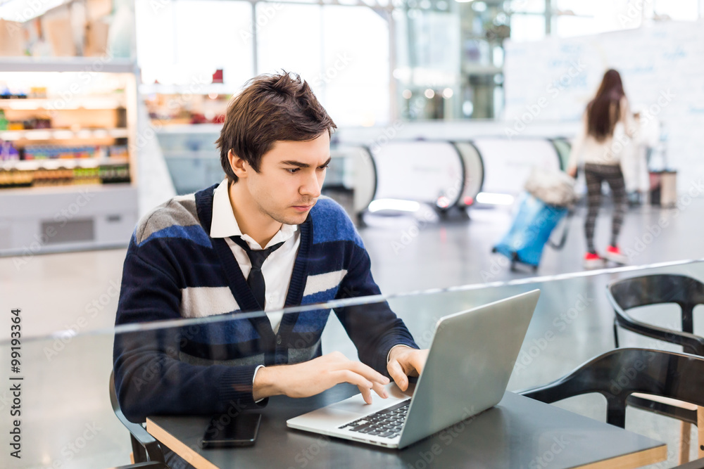 Freelancer concentrated work on laptop Freelancer concentrated work on laptop