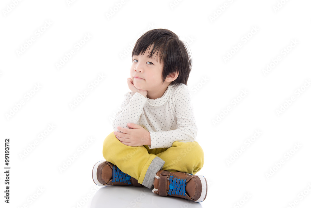 asian child sitting on white background isolated