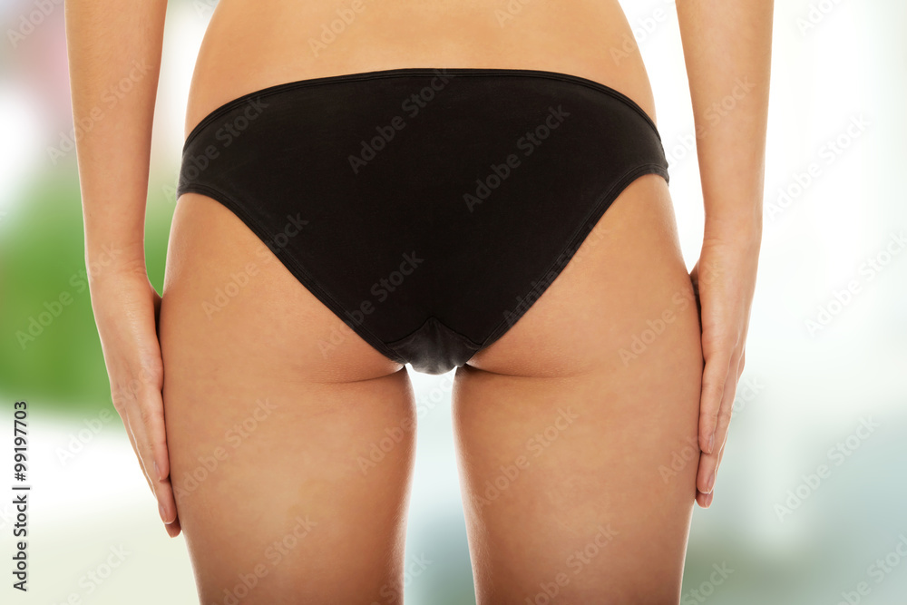 Woman's back in underwear. Woman's back in underwear.