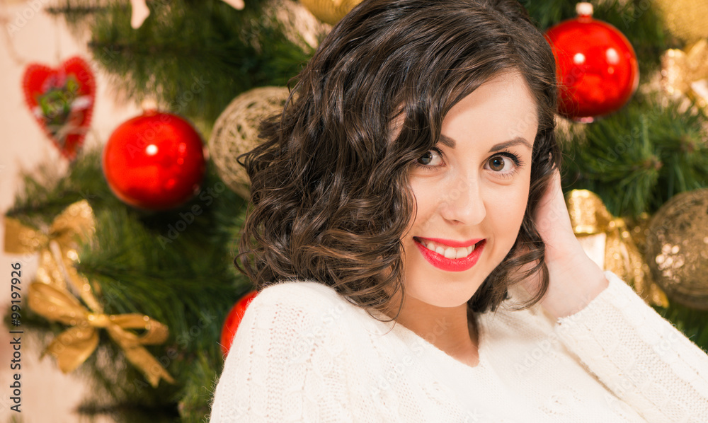 smiling woman portrait at christmas tree smiling woman portrait at christmas tree