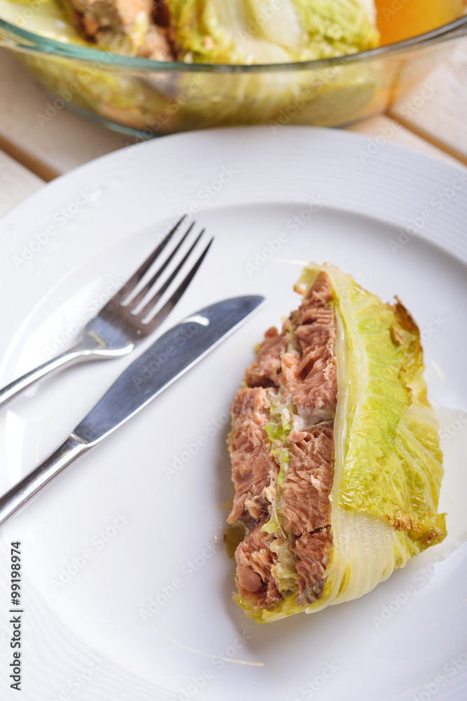 fish baked in leaves of Chinese cabbage with nuts and lemon juic fish baked in leaves of Chinese cabbage with nuts and lemon juic