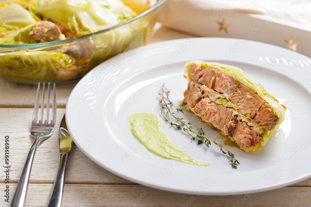 fish baked in leaves of Chinese cabbage with nuts and lemon juic fish baked in leaves of Chinese cabbage with nuts and lemon juic