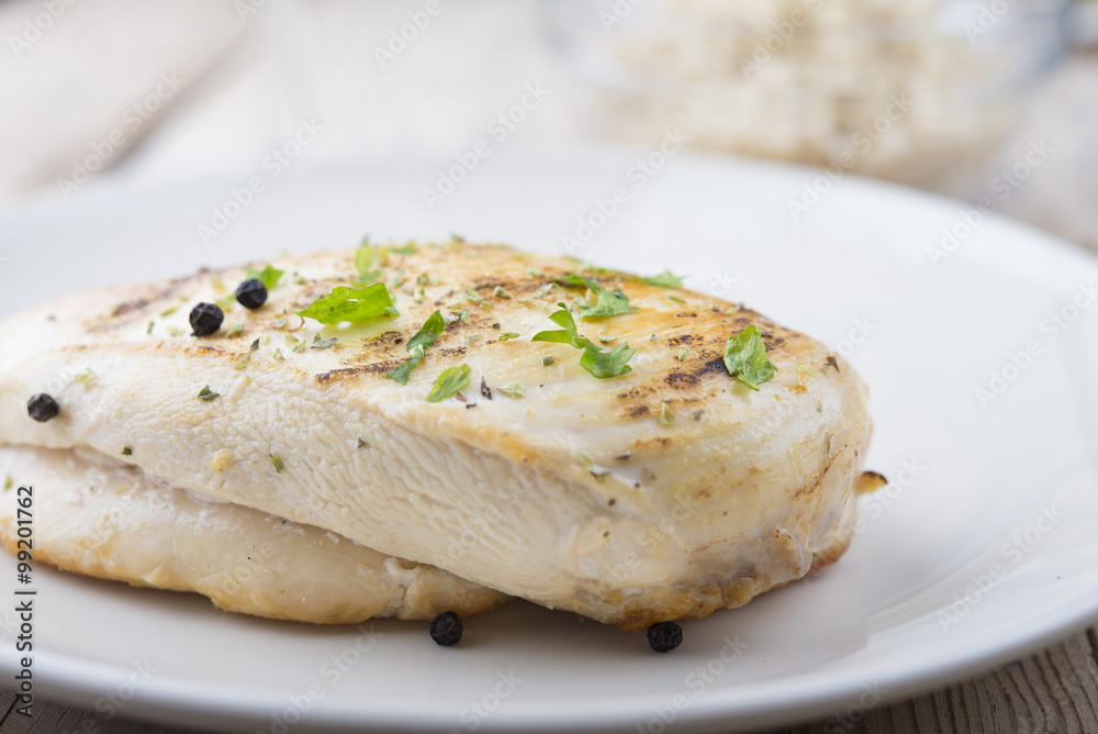 Grilled chicken breast with fresh vegetables . Grilled chicken breast with fresh vegetables .