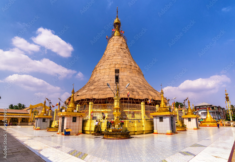 Botataung pagoda in repair with clear blue sky and clouds