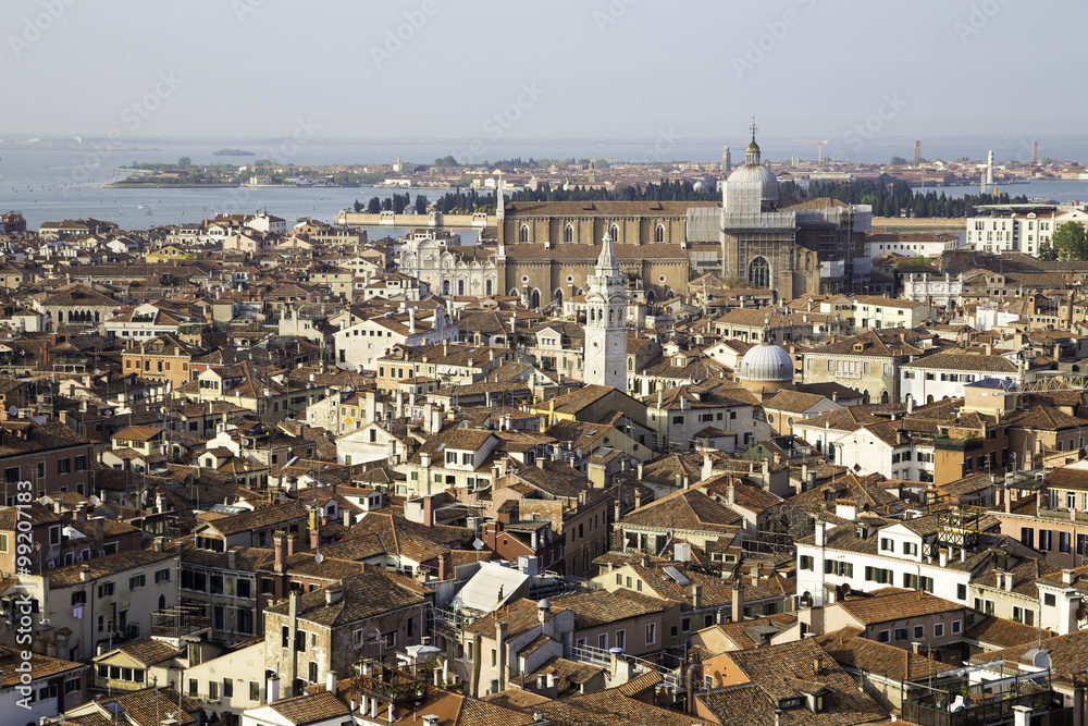 Aerial view of Venice cityscape with roofs of houses from San Marco bell tower, Italy