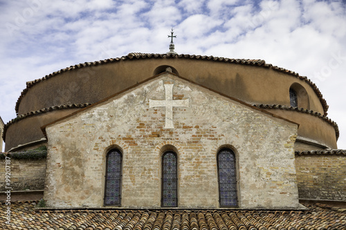 View of the Basilica and Santa Fosca cathedral roof on the island of Torcello which is the oldest building in the lagoon photo