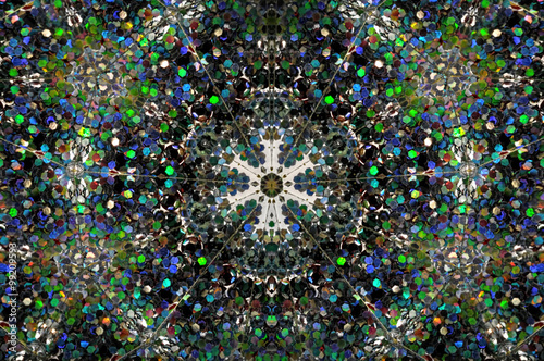Abstract Background kaleidoscope effect polygon circle ornament.