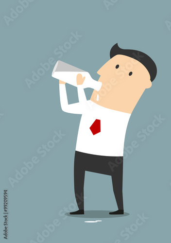 Businessman drinking milk from a bottle