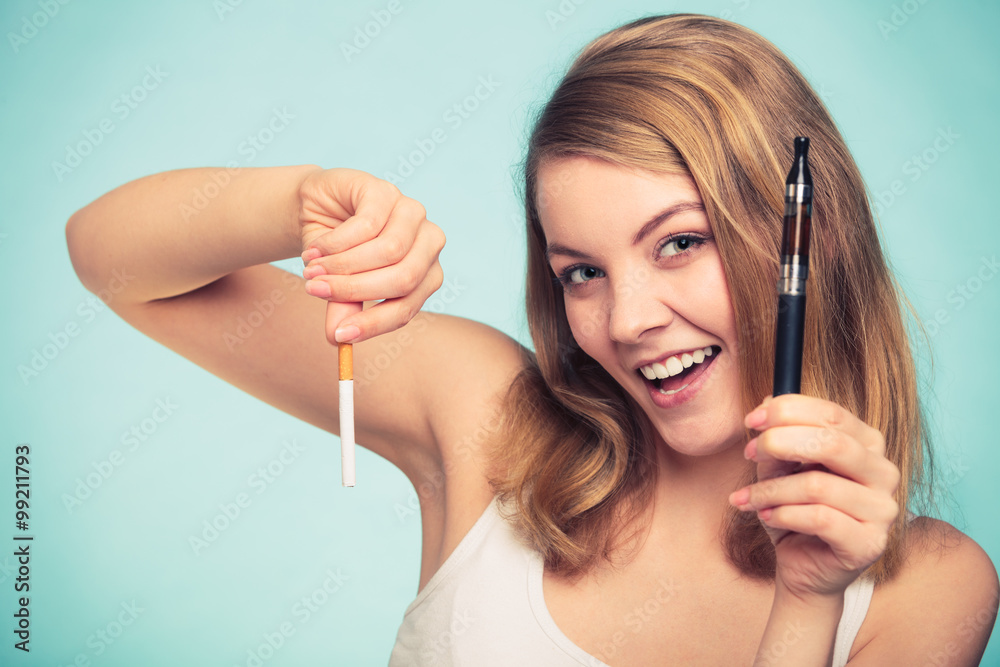 Girl with normal and electronic cigarette. Girl with normal and electronic cigarette.