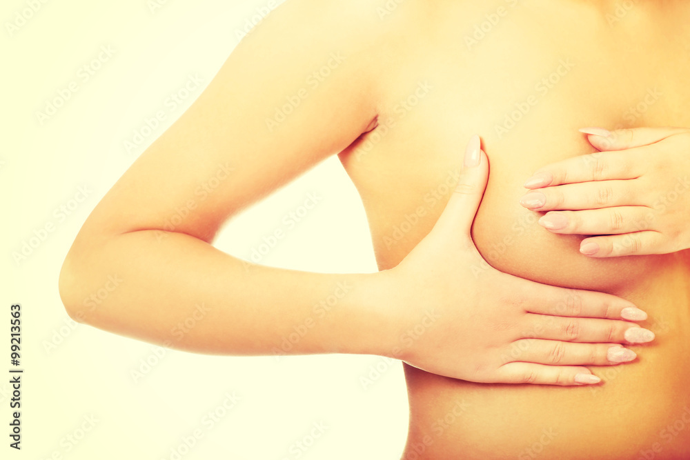 Fototapeta premium Woman examining breast.