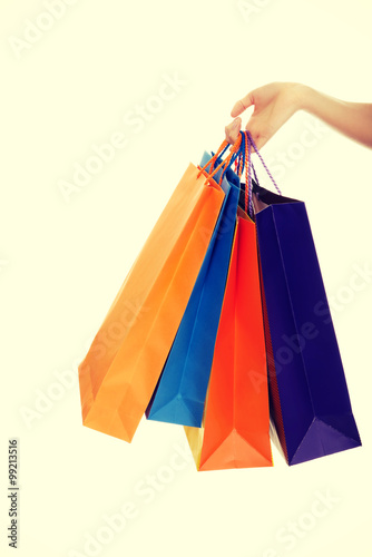 Woman hand with shopping bags.