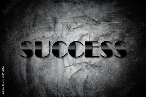Foto Success Concept - Success sign on old cement black wall