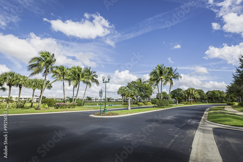 Gated community road to condominiums in tropics