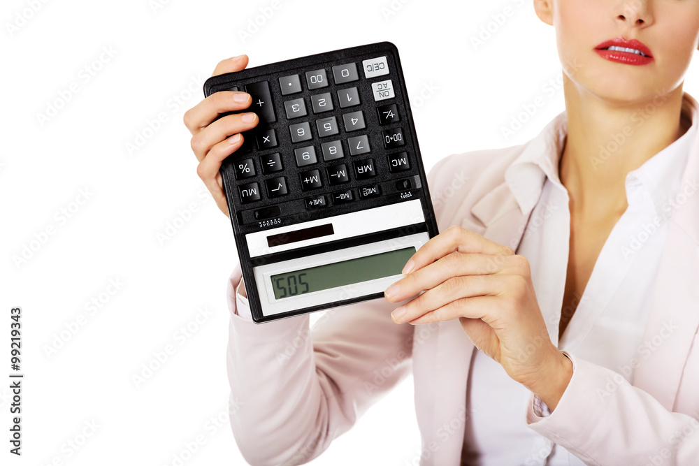 Worried business woman shows sos on calculator Worried business woman shows sos on calculator