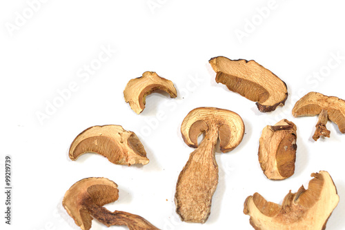 Dried porcini mushrooms on white background