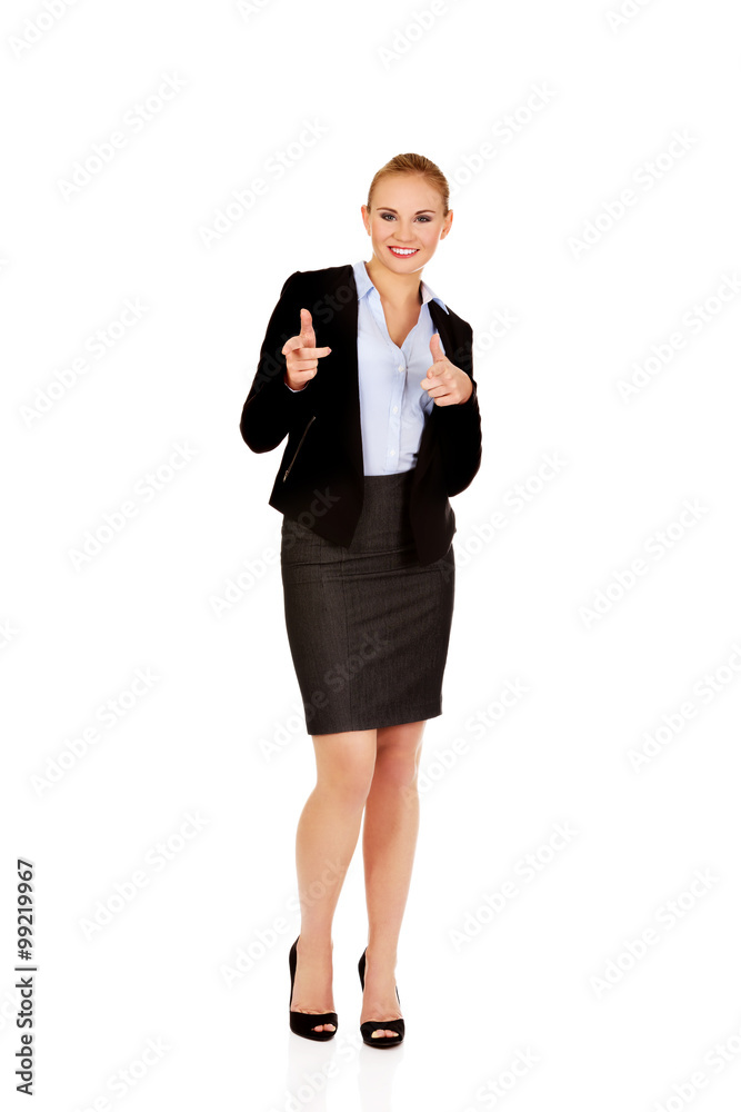 Young business woman making a gun gesture Young business woman making a gun gesture